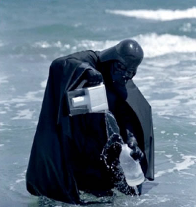 Darth Vader filling a jug with water filtered from the sea