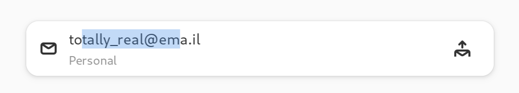 An action row in Contacts, showing a personal email "totally_real@ema.il", a part of the address is selected