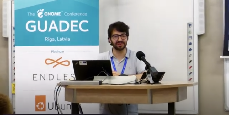 Me giving a speak at GUADEC