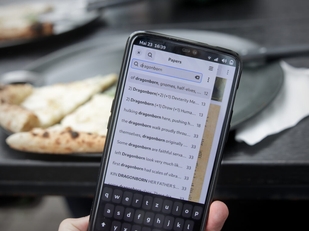 a OnePlus 6 running Papers searching for “dragonborn” in a document