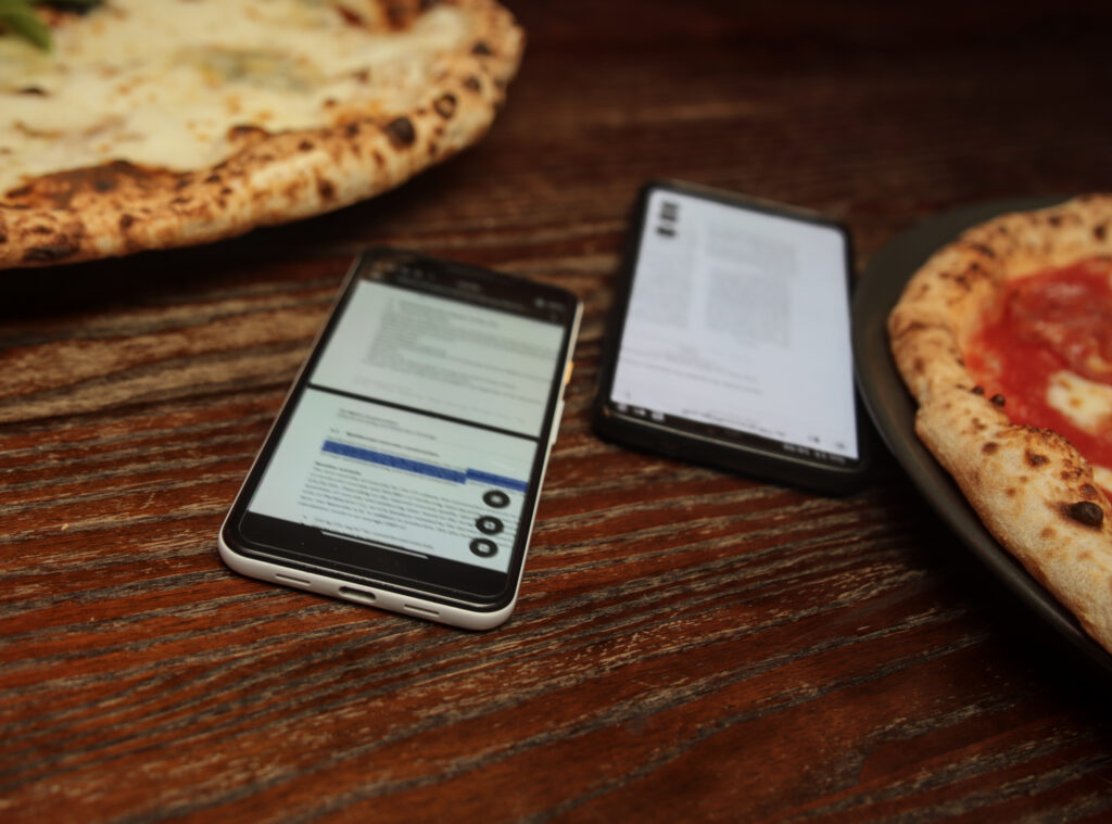 a OnePlus 6 and a Google Pixel 3A running Papers with one of the phones demonstrating a text selection